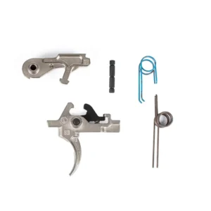 ZEV Core Combat Trigger, disassembled on a white background